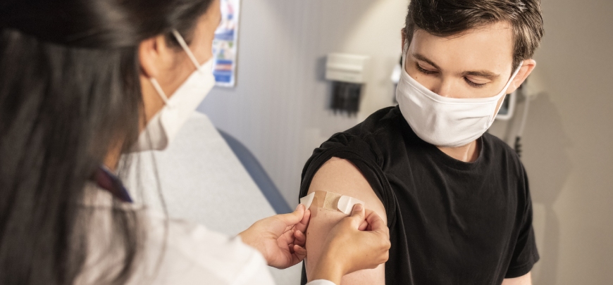 Patient getting a vaccination shot in the clinic